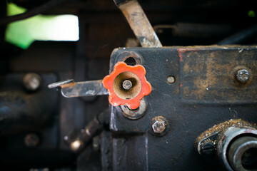 The gas pedal on the motoblock engine. Walk-behind tractor speed regulator