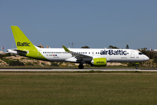 Luqa, Malta - March 26, 2023: Air Baltic Airbus A220-371 (REG: YL-ABK) operating a Swiss Air flight.
