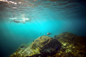 Woman snorkeling alone in open sea, Brazil