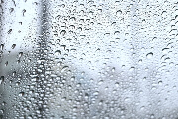 Naklejka na ściany i meble ガラスについた雨の水滴