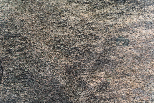 Fond en pierre grise avec une texture l&eacute;g&egrave;rement granuleuse.