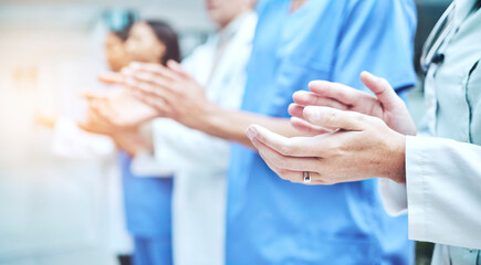 Clapping hands, celebration and team of doctors in the hospital with success in teamwork or...