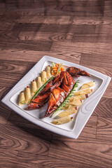 Beijing roasted whole big pipa bbq duck with crepe skin roll and vegetables on wood table background asian Chinese halal banquet meat menu 