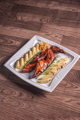 Beijing roasted whole big pipa bbq duck with crepe skin roll and vegetables on wood table background asian Chinese halal banquet meat menu 