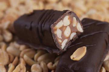 Chocolate bar with peanuts and peanuts