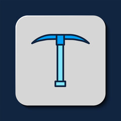 Filled outline Pickaxe icon isolated on blue background. Vector