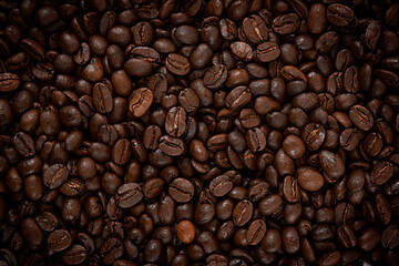 Fototapeta premium Roasted coffee beans. Texture of coffee beans. Coffee background. Can be used as wallpaper.
