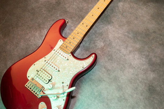 Close up of a Fender Stratocaster USA electric guitar in the color red