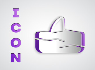 Paper cut Shark fin in ocean wave icon isolated on grey background. Paper art style. Vector