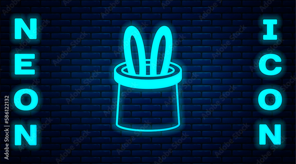 Wall mural glowing neon magician hat and rabbit ears icon isolated on brick wall background. magic trick. myste