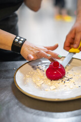 Chef cooking Dessert cake with fruit on restaurant kitchen