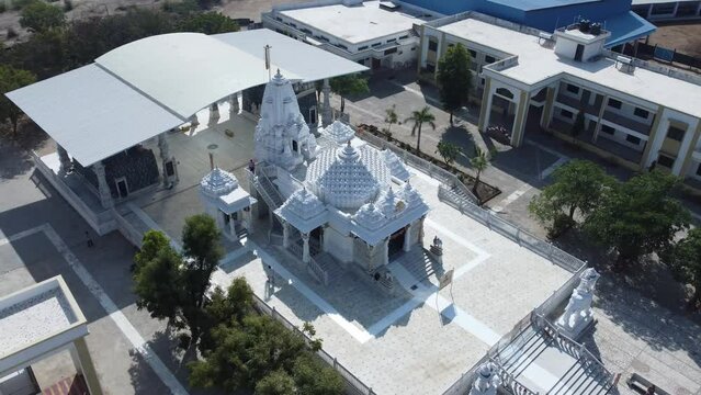 Unhel, Rajasthan, India 12th March 2023: 4k Drone shots of Shri Nageshwar Parshwanath Tirth or Shri Jain Shwetamber Nageshwar Parshwanath Tirth Pedhi is a Jain Temple. Standing Jain Murti or Idol.