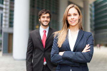 Smiling business people