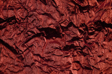 Gold paper texture background. Abstract texture background of wrinkled golden paper. Crumpled foil texture background. Old gold. Matte texture. Abstract background