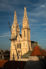 Obraz premium The silhouette of famous gothic catholic cathedral church of Zagreb, Croatia located in the tourist center of the city called Gornji grad (Uptown)