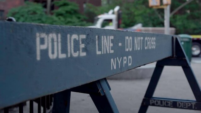 Police Line Do Not Cross barricade.