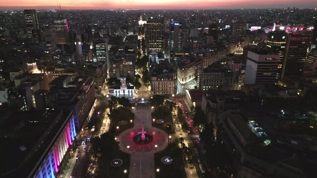 Aerial Drone Fly Above Buenos Aires Plaza de Mayo at Night Argentine City Square Cabildo, Metropolitan Cathedral, Avenues with Neon Lights