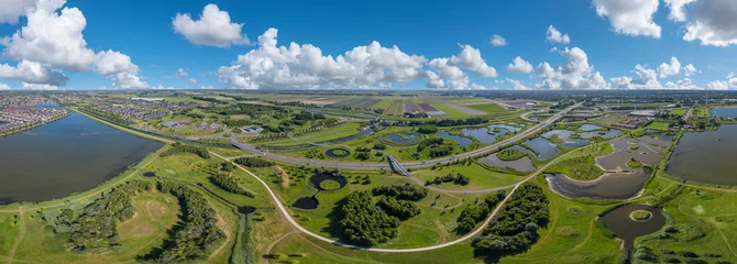 Poster Luftaufnahme mit dem Park van Luna und dem Ortsteil Stad van de Zon in Heerhugowaard. Provinz Nordholland in den Niederlanden © Jürgen Wackenhut