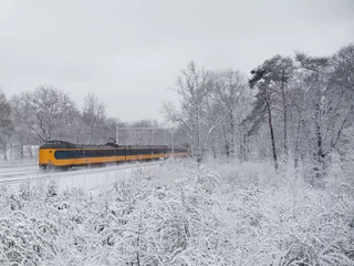 Foto auf Leinwand Dutch train in snowy conditions © Barry
