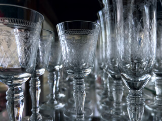 Set of empty glasses on the table indoors. Wine glasses on the table. Selective focus.