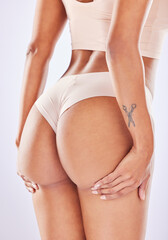Butt, woman beauty and self care in a studio with wellness, underwear and fitness. Beauty cosmetics, liposuction and cellulite treatment of a female with skin glow with isolated white background