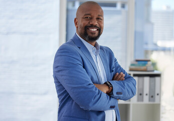 Happy black man, arms crossed or office portrait of corporate motivation in company about us or profile picture. Smile, confident or mature management person and success mindset or CEO introduction