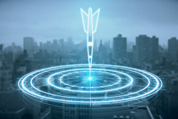 Digital bullseye aim with arrow hologram on blurry city background. Aiming, success and targeting concept. Double exposure.
