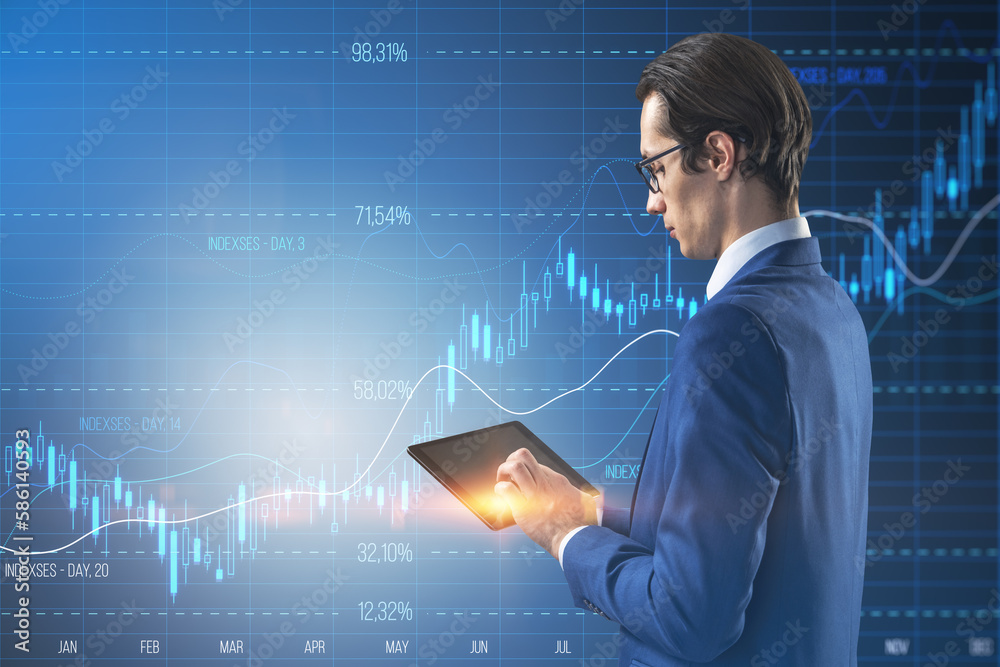 Poster attractive young european businessman using tablet with glowing candlestick forex chart with index o