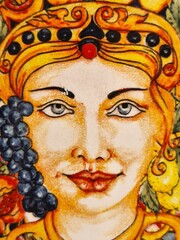 detail of painting of a woman of handicraft production
Sicilian to promote the Sicily region in Italy