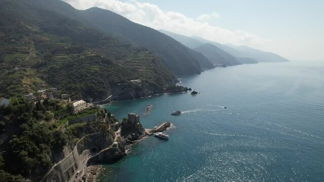 Aerial video over a small colorful town, Monterosso al Mare Italy