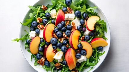 Fresh and Flavorful Peach, Blueberry, and Arugula Salad with Almonds and Cheese