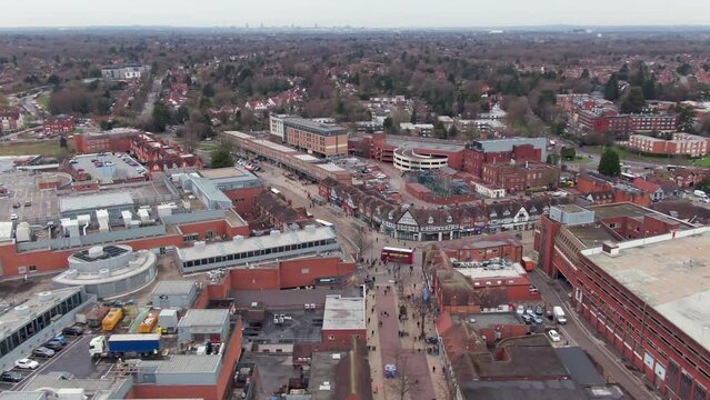 Panorama orbiting aerial over city centre in Solihull England