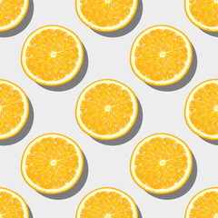 Pattern created from halved oranges with shadow