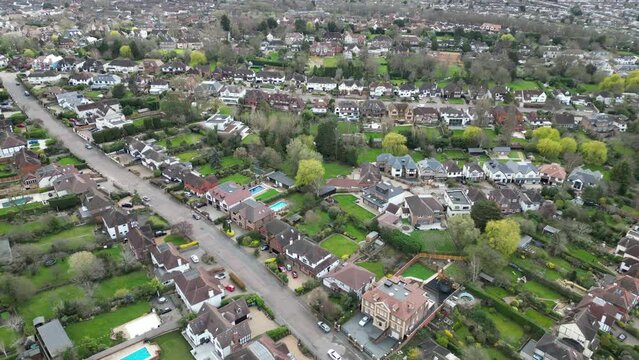 Panning drone aerial view Loughton Essex UK town centre streets and roads