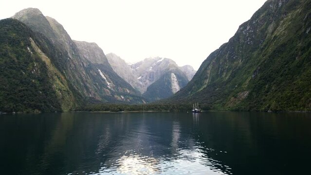 Drone fly above Harrison Cove and River, Mt Pembroke and glacier , Milford Sound, Fiordland aerial footage of stunning landscape from new Zealand nz wilderness unpolluted destination