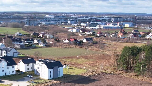 Residential Houses And Fields Near The Gdansk Lech Walesa Airport In Poland. - aerial ascend
