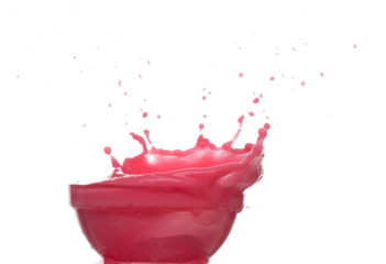 Red tomato strawberry juice spill splash in glass bowl, Red blood wave fall in air. Red Wine colored explosion spill out up. White background Isolated high speed shutter, freeze motion