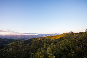 Fototapeta na wymiar Autumn sunrise in the top of mountain in La Garrotxa, Spain