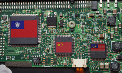China, Taiwan and Malaysia flags print screen to microchip. Some chip producing countries in Asia.
