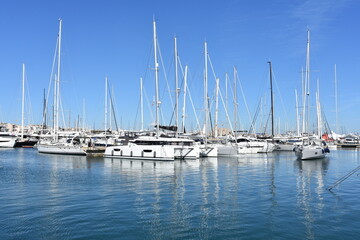 Fototapeta premium Palma, de Mallorca, island, Baleares, Spain, marina, harbor, yachts, sailboats, city, vacation, luxury, boat, yacht, ship, harbour, port, sailing, dock, travel