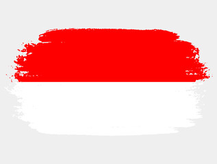 Artistic grunge brush flag of Indonesia isolated on white background. Elegant texture of national country flag