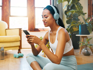 Headphones, phone and yoga woman listening to meditation music, podcast or wellness audio for...