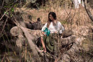 Jug of courage: young woman crossing the bridge to face her fears. Lady's moment of reflection and renewal in a journey of reflection and growth.