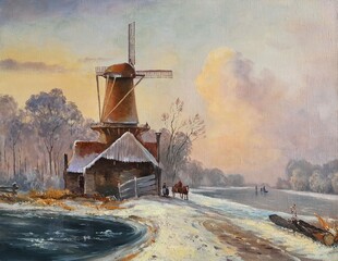 mill near an ice-covered river with snow-covered banks