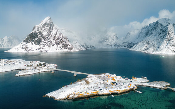Charming typical fishing village in Norway - lofotens - Sakrisoy. Aerial view. Panoramic image. Breathtaking winter landscape.