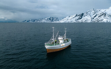 Cod fishing boat on its way to harbor. Lofoten Islands, Norway © Pavel Kašák