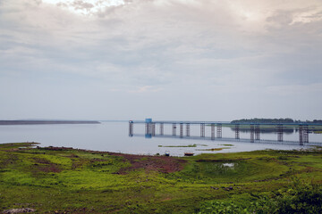 Dam in Mukutmanipur, West Bengal with a beautiful landscape in the background. Cloudy day.