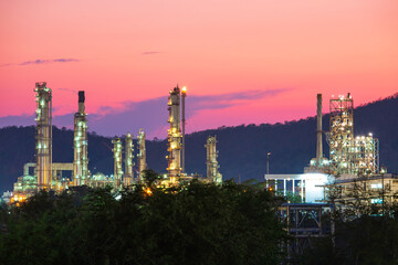 Twilight sun orange scene of oil refinery plant and tower column oil of Petrochemistry industry