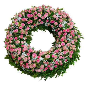 Trauerkranz mit rosafarbenen Blumen