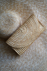 Straw hat and clutch bag, close-up